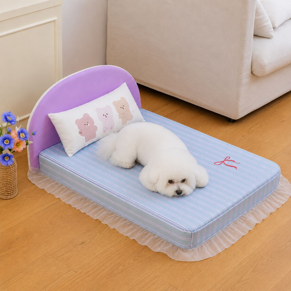lit pour chien bleu chien endormi volants blancs