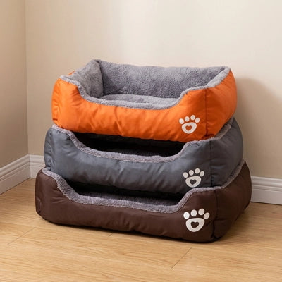 lit pour chien moelleux orange gris rebords rembourres confortable