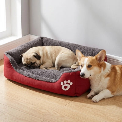 lit pour chien rouge moelleux rebords rembourres
