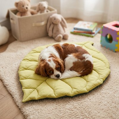 Tapis chien doux en forme de feuille pour un repos paisible